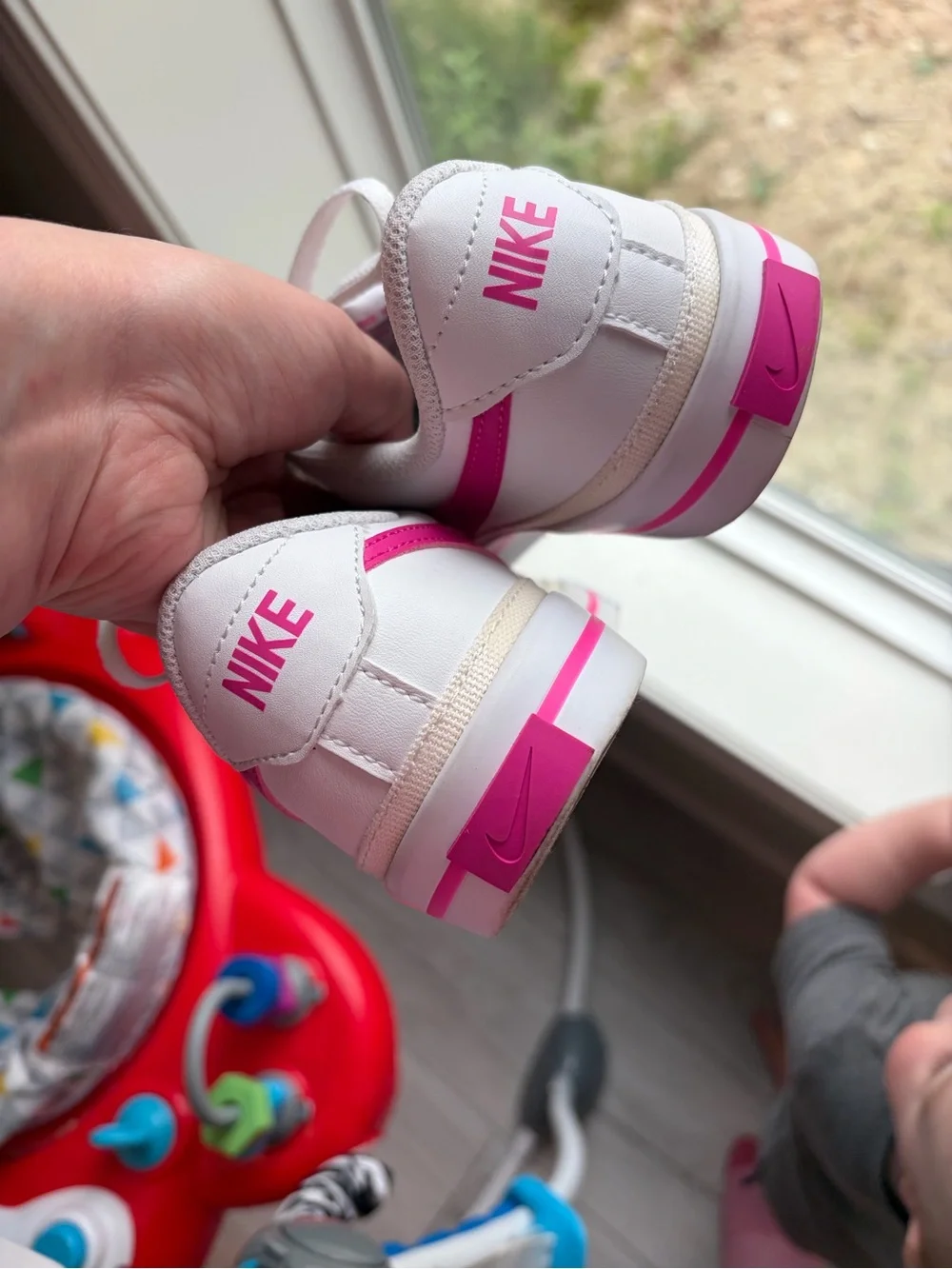 Nike White Sneakers with Pink Swoosh and Accent Stripe